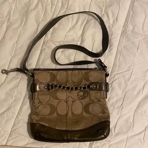 Adjustable strap brown coach bag